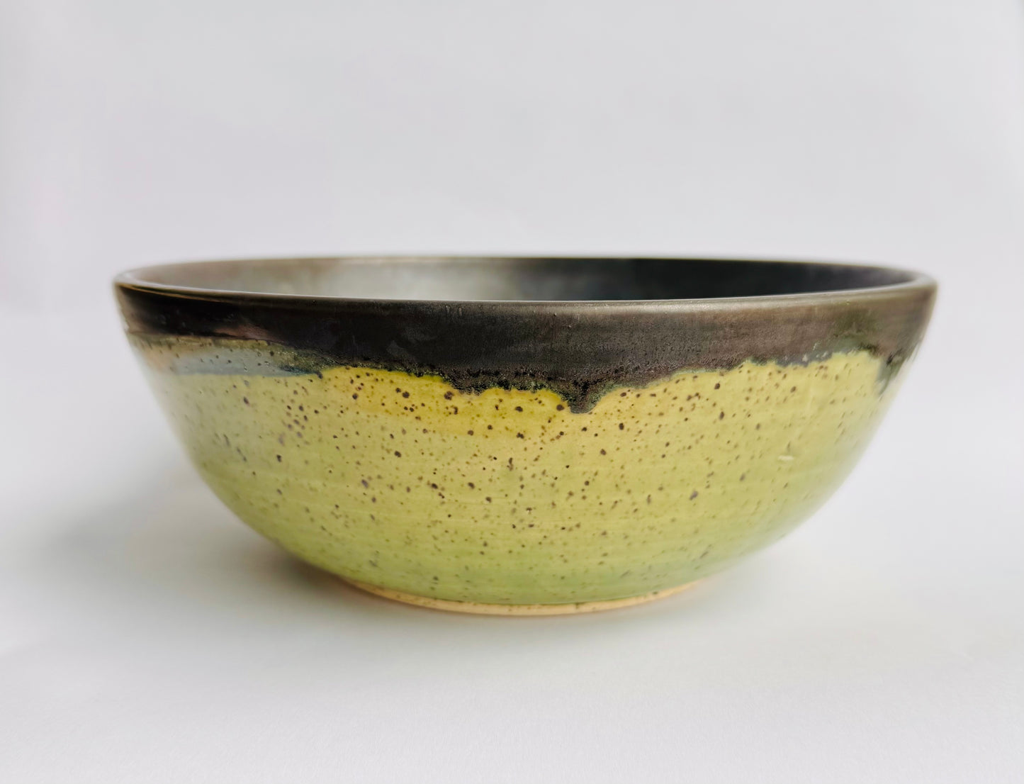 Green Speckled Large Serving Bowl with Black Rim & Interior